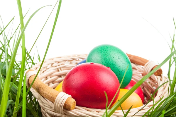 Easter basket with colored eggs — Stock Photo, Image