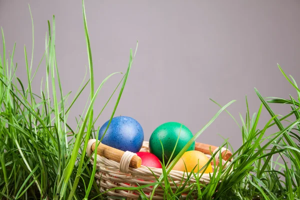 Easter basket with colored eggs — Stock Photo, Image