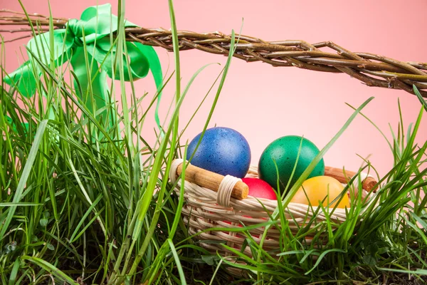 Easter basket with colored eggs — Stock Photo, Image