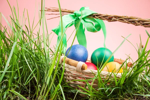 Easter basket with colored eggs — Stock Photo, Image