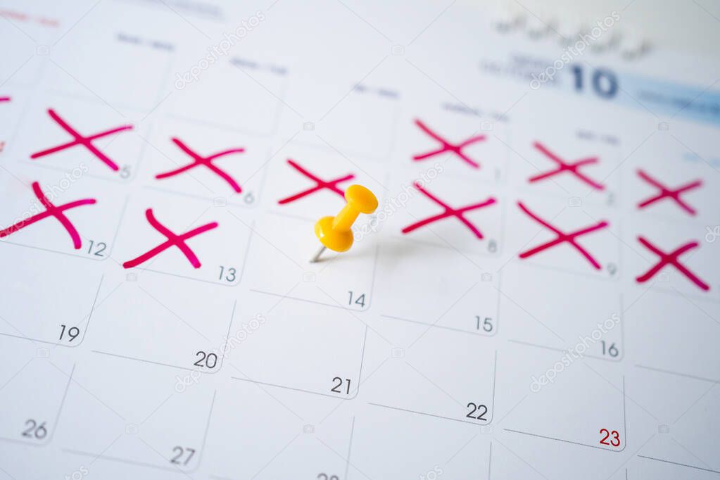 Calendar with yellow pins on February 14 is the day of love.