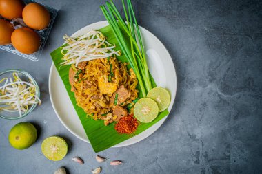 Padthai noodle with smoke tofu and mixed vegetable with copy space.