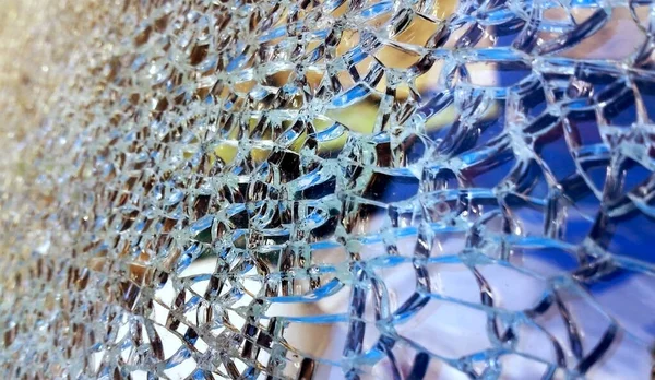 Background of broken cracked abstract glass pattern. Cross section of broken glass side view.