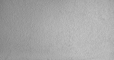 Beyaz bir duvarda yumuşak bir ışık.