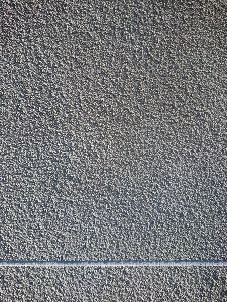 Gray background texture, splashing plaster wall facade and white line — Fotografia de Stock