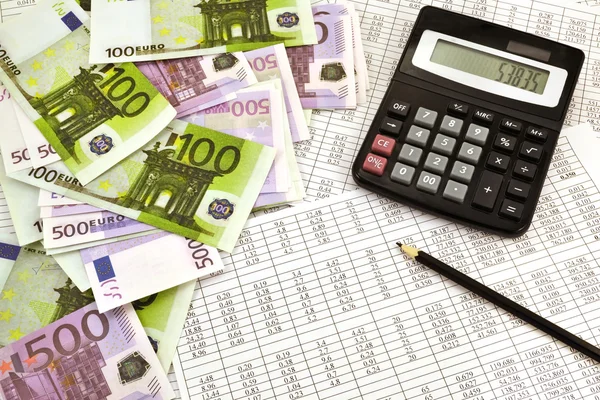 Geld met calculator — Stockfoto