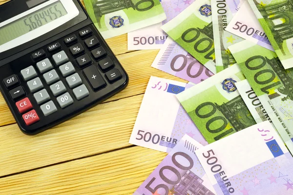 Geld met calculator — Stockfoto