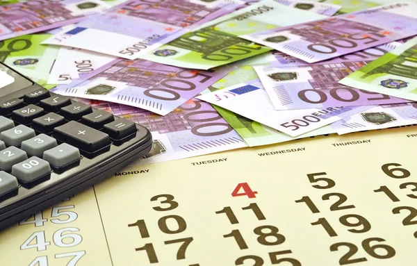 Geld met calculator — Stockfoto