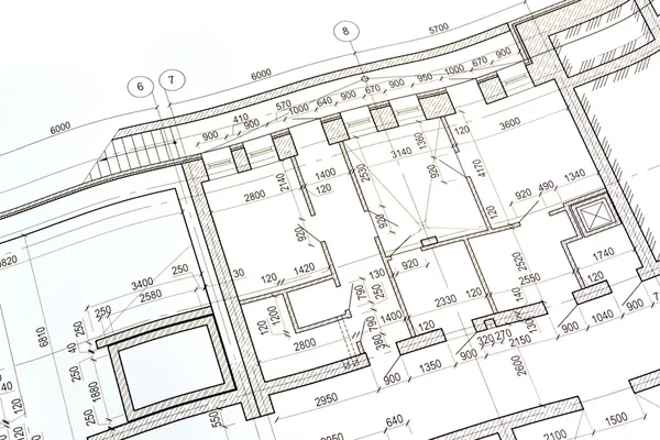 Составление плана этажа здания — стоковое фото