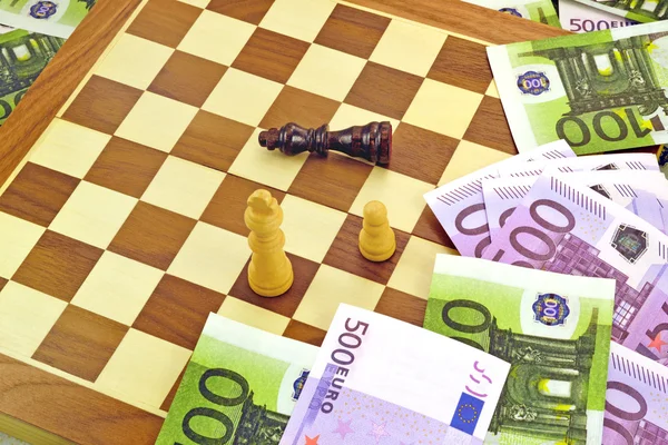 Money and chess — Stock Photo, Image