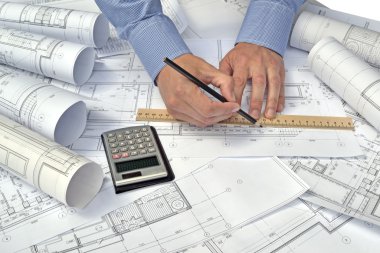Hands and project drawings