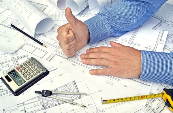 Hands and project drawings — Stock Photo, Image
