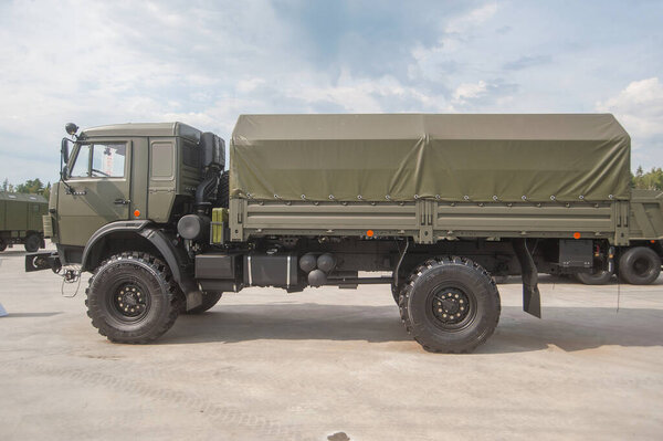 MILITARY GROUND ALABINO, MOSCOW OBLAST, RUSSIA - Aug 22, 2017: New Russian truck KAMAZ-4350 Mustang on International military-technical forum Army-2017, left view