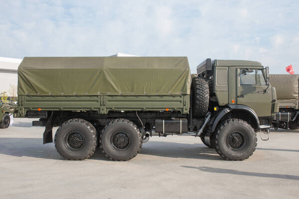 MILITARY GROUND ALABINO, MOSCOW OBLAST, RUSSIA - Aug 22, 2017: Russian truck KAMAZ-5350 family "Mustang" in the International military-technical forum Army-2017, right side view