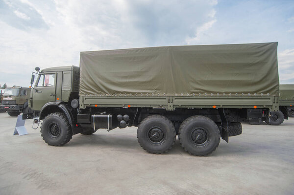 MILITARY GROUND ALABINO, MOSCOW OBLAST, RUSSIA - Aug 22, 2017: Russian truck KAMAZ-53501 family "Mustang" in the International military-technical forum Army-2017, left view