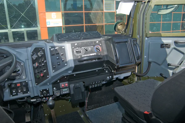 The cab interior armored car Ural-4320VV at the exhibition "Integrated safety and security-2014", Moscow, dashboard — Stock Photo, Image