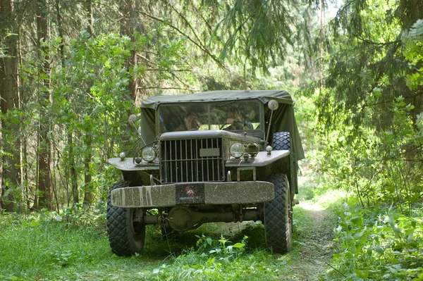 Army American car Dodge WC-51 on retro rally in the woods, 3rd international meeting 