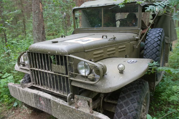 American military retro car Dodge WC-51 on retro rally in the woods, 3rd international meeting "Motors of war" near the city Chernogolovka, a fragment of the front of the — Stock Photo, Image