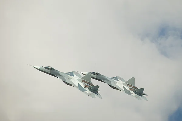 International aviation and space salon MAKS-2013. Group flight of the new multi-istrebitelya fifth generation PAK FA  (T-50) — Stock Photo, Image