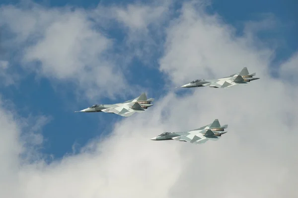 International aviation and space salon MAKS-2013. Group flight of three new multi-purpose fighters of the fifth generation PAK FA, T-50 — Stock Photo, Image