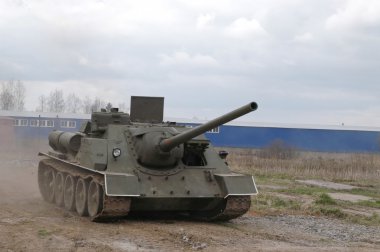 Soviet self-propelled gun Su-100 in motion at the landfill in Kubinka
