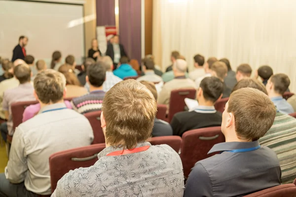 People at conference hall, rear view — Stock Photo, Image