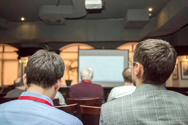 Audience at a conference presentation. — Stock Photo, Image
