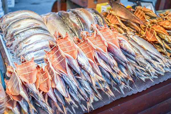 Dried fish Omul lying on the counter in Listvyanka, Lake Baikal