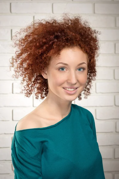 Portrait of smiling young red hair attractive woman — Stock Photo, Image