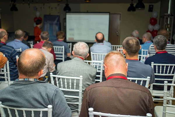 Zakelijke bijeenkomst. Achteraanzicht van publiek. — Stockfoto