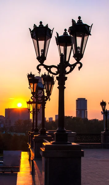 Yekaterinburg town throw the street lights in the sunset — Stock Photo, Image