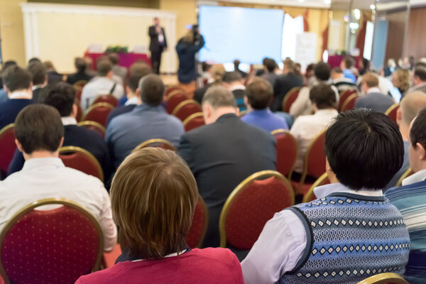 People sitting rear at the business conference