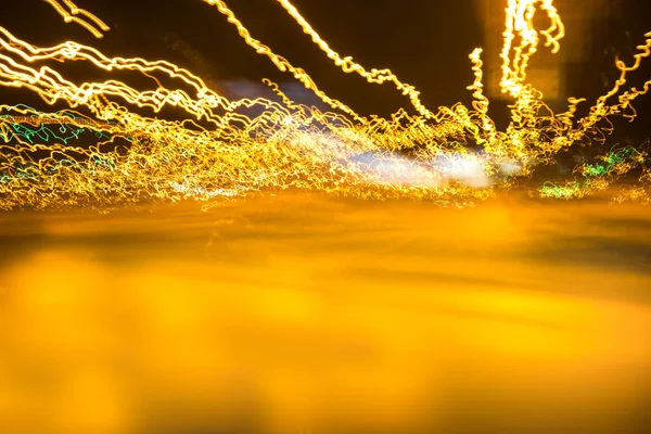 Imagem abstrata das luzes bokeh na cidade como fundo — Fotografia de Stock