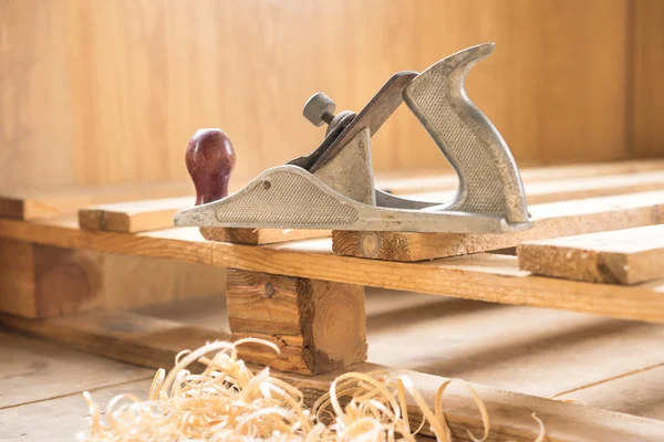 Jointer and sawdust in a wooden floor on a construction. — Stock Photo, Image