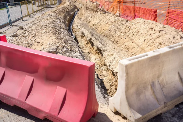 Obstruction of the trench dug in the earth — Stock Photo, Image