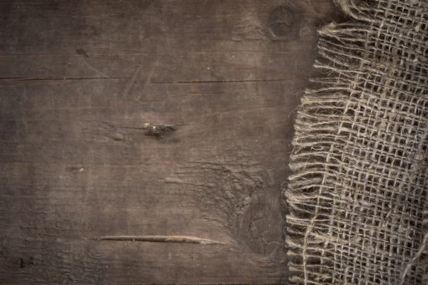 Çavuş çuval doku ve ahşap tahta tablo arka planı — Stok fotoğraf