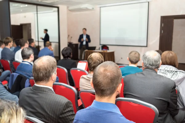 Audience at the conference hall. Business presentation. — Stock Photo, Image