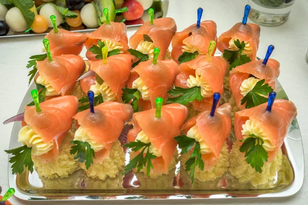 Mini canapes with smoked salmon — Stock Photo, Image