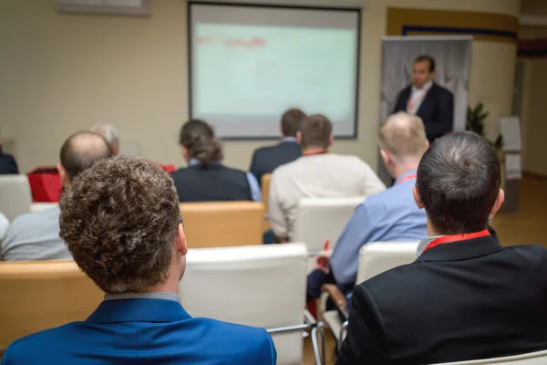 Publiken i konferenssalen. — Stockfoto