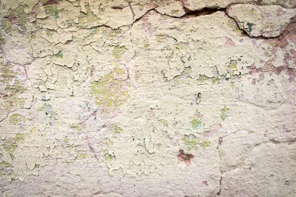 Popraskané a loupání barvy a grunge stará zeď s texturou — Stock fotografie