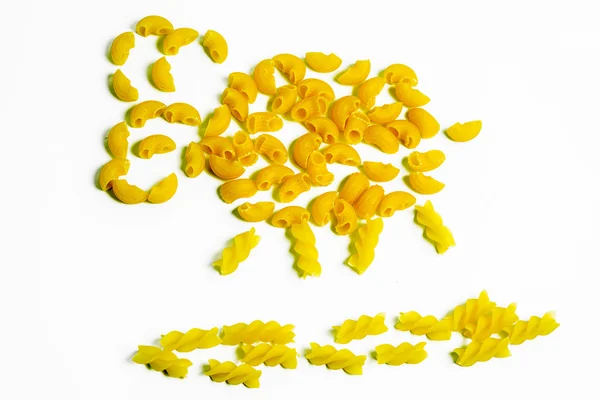 Silhouet van schapen gemaakt van pasta, op een witte achtergrond — Stockfoto
