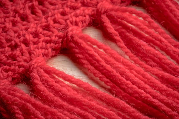 Textura červené vlněné ručně šátek s třásněmi — Stock fotografie