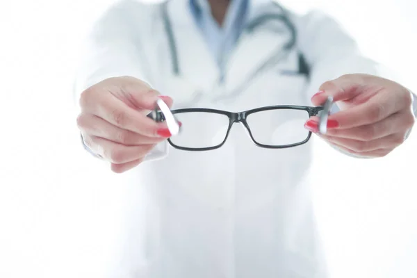 Optometrist Holding Pair Glasses — Stock Photo, Image