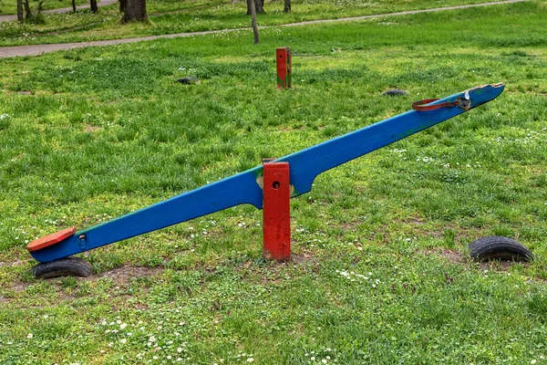 Wooden teeter totter in public park