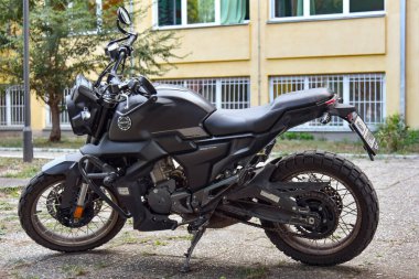 Novi Sad, Serbia - November 11, 2025: Adventure motorcycle Zontes parked on urban street in Novi Sad