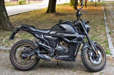Novi Sad, Serbia - November 11, 2025: Adventure motorcycle Zontes parked on urban street in Novi Sad