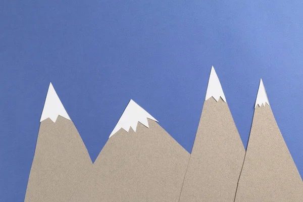 mountains, stars from paper. Concept hike, lodging, walks, crafts, handmade origami, decorative. Flatlay, copyspace, banner.