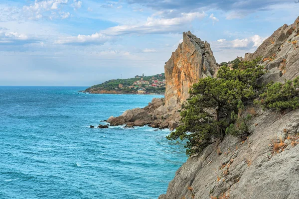 Seascape, black sea coast near the city of Simeiz. Steep rocky precipitous rocks in some places of the black sea become the coastline