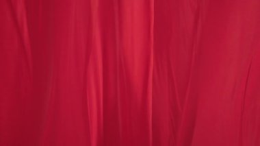 Yüksek hızlı çekim, yavaş çekim, titreyen pembe arka plan örtüsü.,