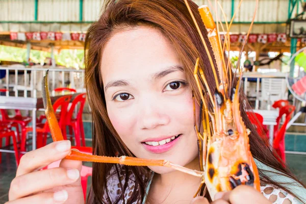Teenage girl with grilled prawns, samui thailand — Stock Photo, Image